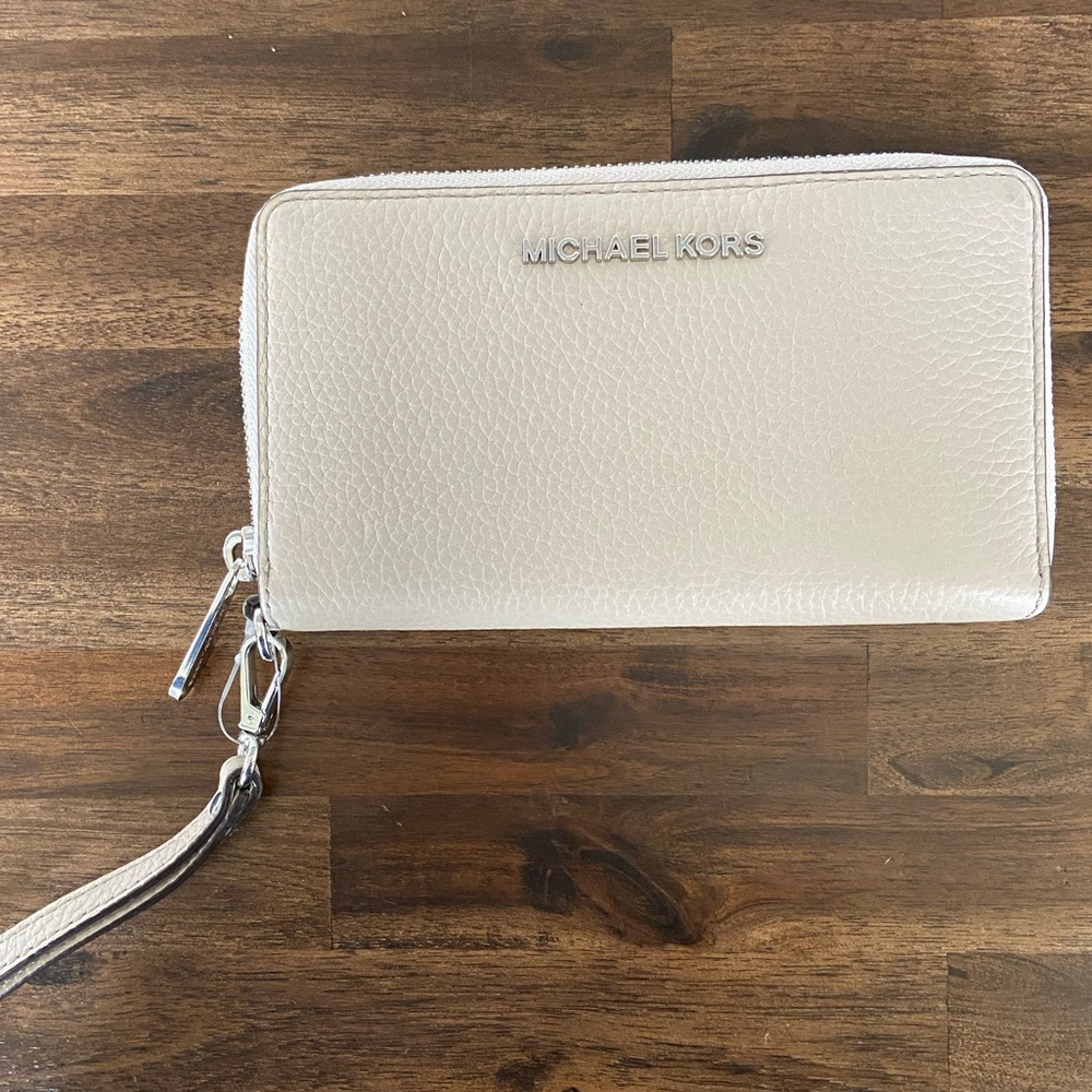 Michael Kors tan wallet with wristlet strap